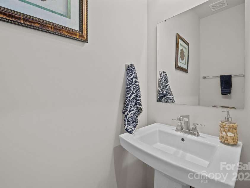 7005 Old Evergreen Parkway, Indian Trail, NC 28079.  MLS# CAR4287200, YatesRealty ID 32710. Downstairs Half bath