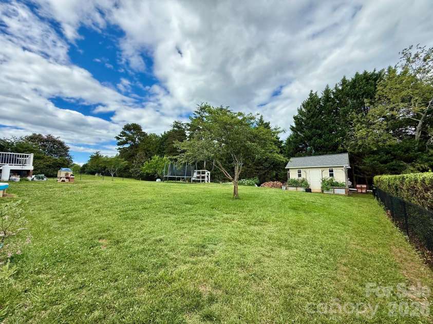5360 Stonegate Farm Drive, Granite Falls, NC 28630.  MLS# CAR4396768, YatesRealty ID 32711. Backyard