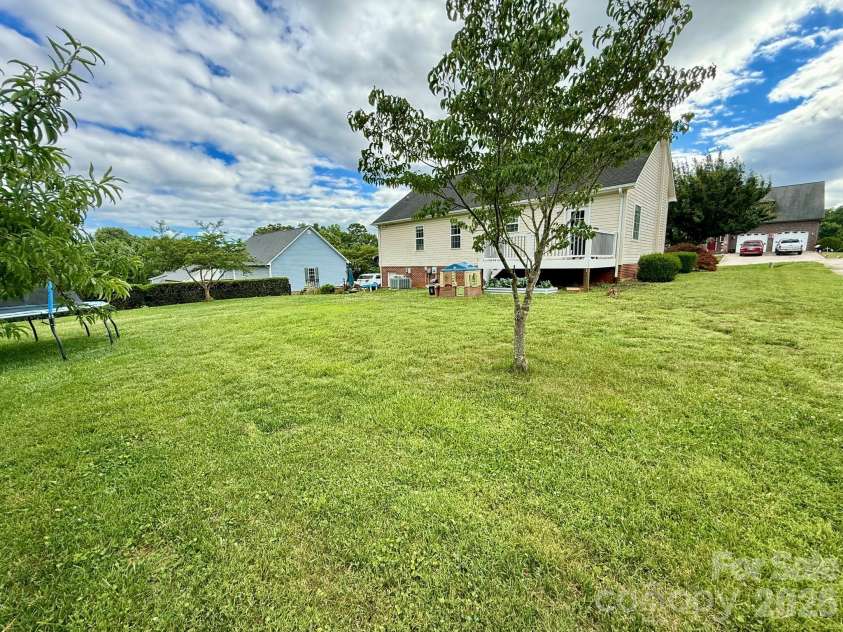 5360 Stonegate Farm Drive, Granite Falls, NC 28630.  MLS# CAR4396768, YatesRealty ID 32711. Backyard