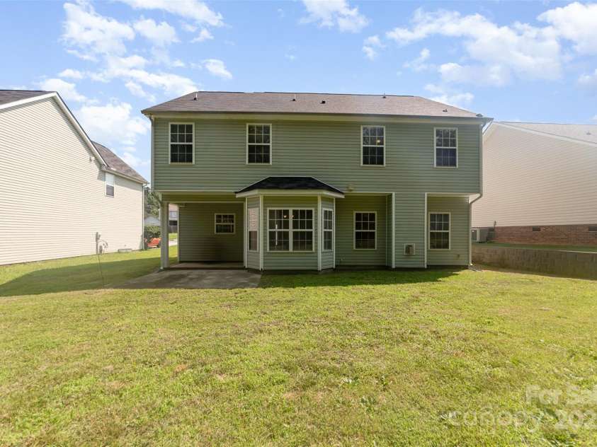 5233 Halverson Court, Kannapolis, NC 28083.  MLS# CAR4273326, YatesRealty ID 32714. Spacious backyard with covered patio