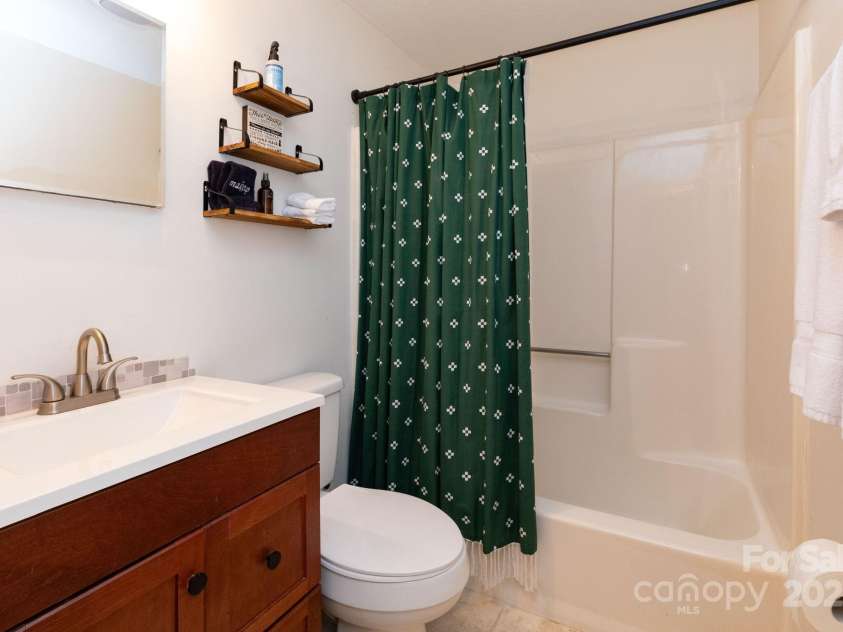 920 McKinney Gap Drive, Mars Hill, NC 28754.  MLS# CAR4277067, YatesRealty ID 32718. Main Level Bathroom