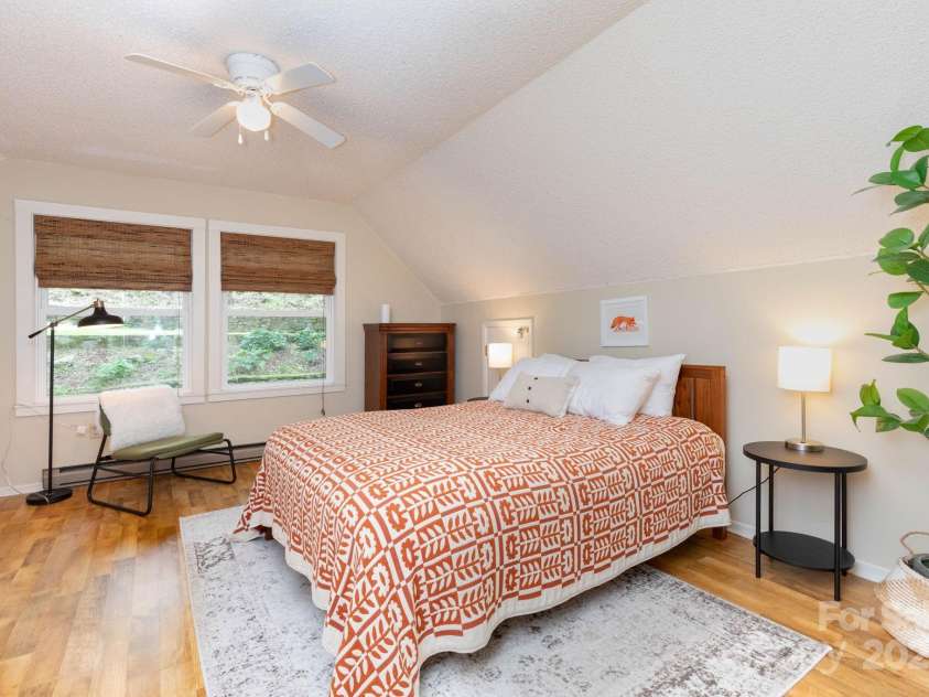 920 McKinney Gap Drive, Mars Hill, NC 28754.  MLS# CAR4277067, YatesRealty ID 32718. Upstairs Bedroom 1 with ensuite bathroom