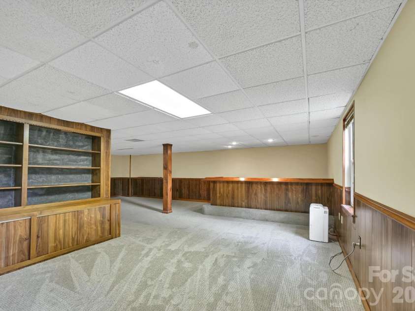 31 Surrey Run, Asheville, NC 28803.  MLS# CAR4387615, YatesRealty ID 32719. Basement Entry