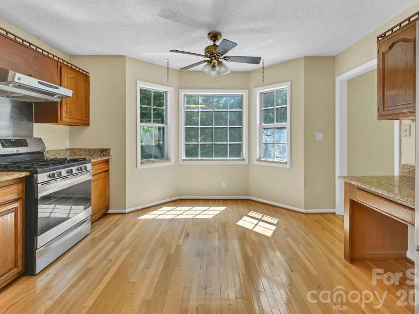 31 Surrey Run, Asheville, NC 28803.  MLS# CAR4387615, YatesRealty ID 32719. Full Kitchen Facing Driveway