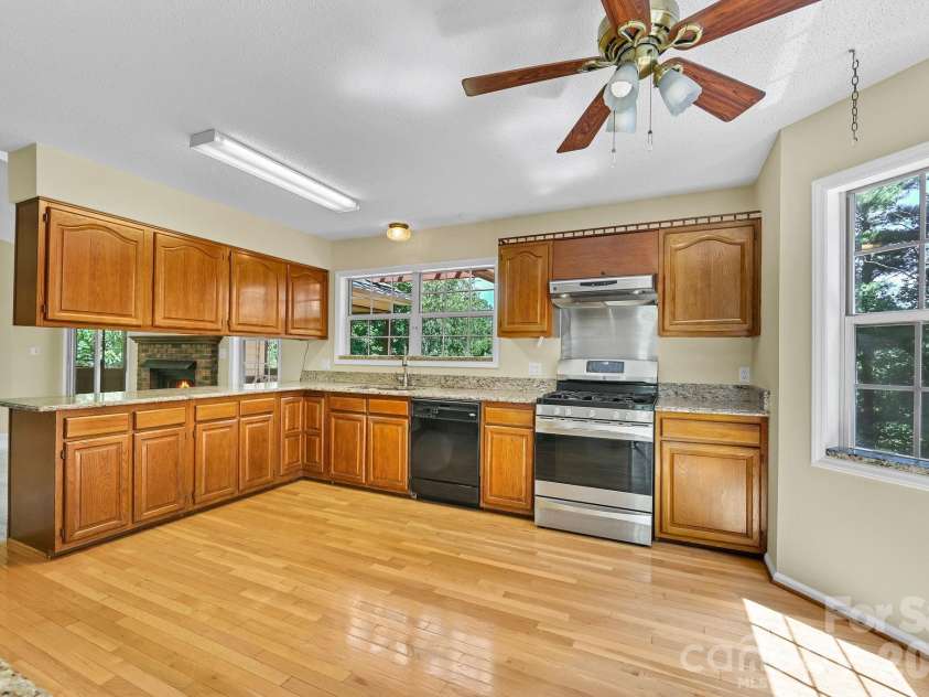 31 Surrey Run, Asheville, NC 28803.  MLS# CAR4387615, YatesRealty ID 32719. Kitchen Facing Back Yard