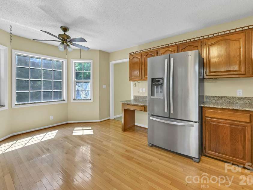 31 Surrey Run, Asheville, NC 28803.  MLS# CAR4387615, YatesRealty ID 32719. Kitchen Facing Driveway