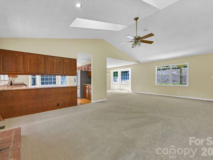 31 Surrey Run, Asheville, NC 28803.  MLS# CAR4387615, YatesRealty ID 32719. Living Room Facing Kitchen