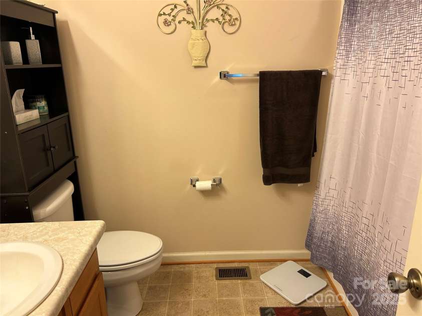 8799 Lisa Trail, Connelly Springs, NC 28612.  MLS# CAR4292879, YatesRealty ID 32719. Ensuite Bathroom