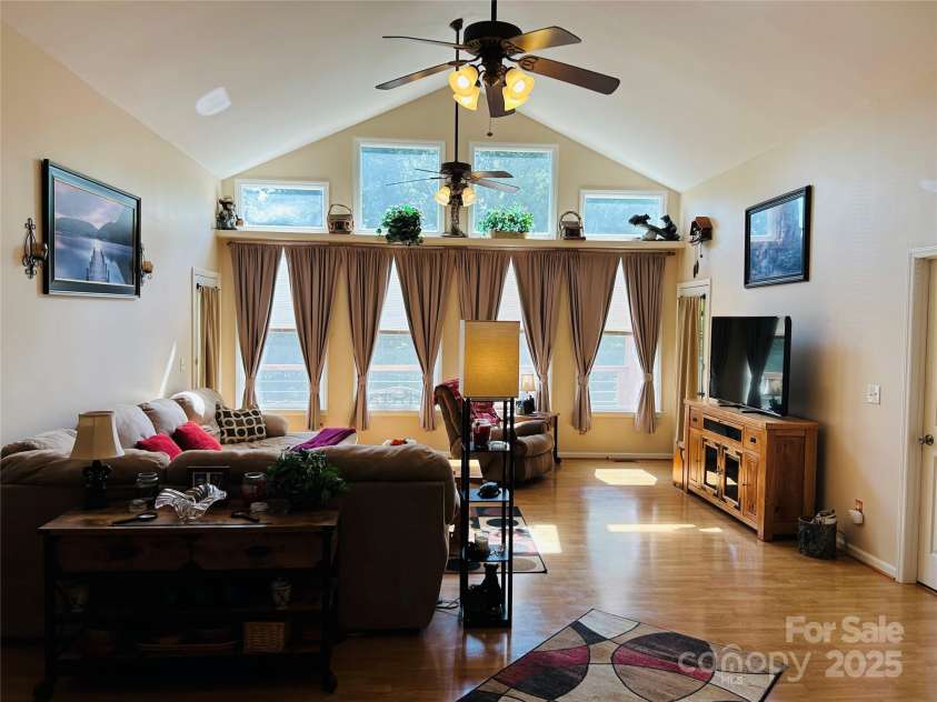 8799 Lisa Trail, Connelly Springs, NC 28612.  MLS# CAR4292879, YatesRealty ID 32719. Great Room with Cathedral Ceilings