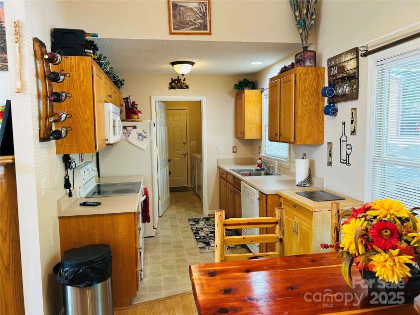 8799 Lisa Trail, Connelly Springs, NC 28612.  MLS# CAR4292879, YatesRealty ID 32719. Kitchen and Dining Combo