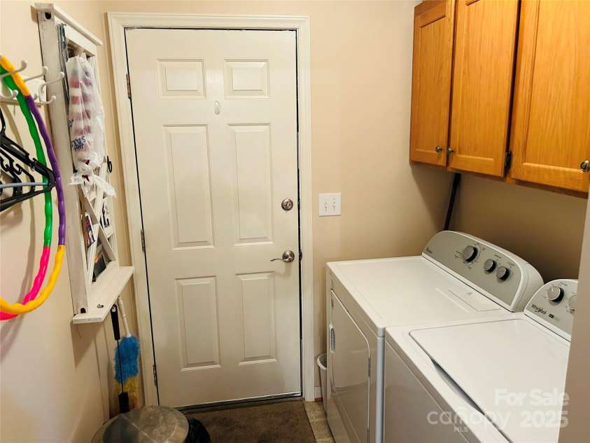 8799 Lisa Trail, Connelly Springs, NC 28612.  MLS# CAR4292879, YatesRealty ID 32719. Laundry with Storage Above