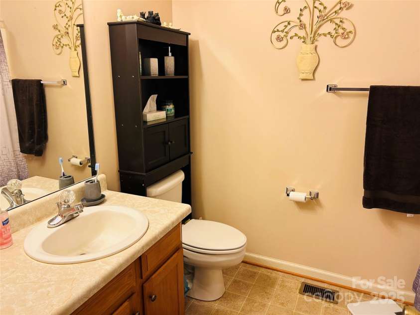 8799 Lisa Trail, Connelly Springs, NC 28612.  MLS# CAR4292879, YatesRealty ID 32719. Primary Ensuite Bathroom