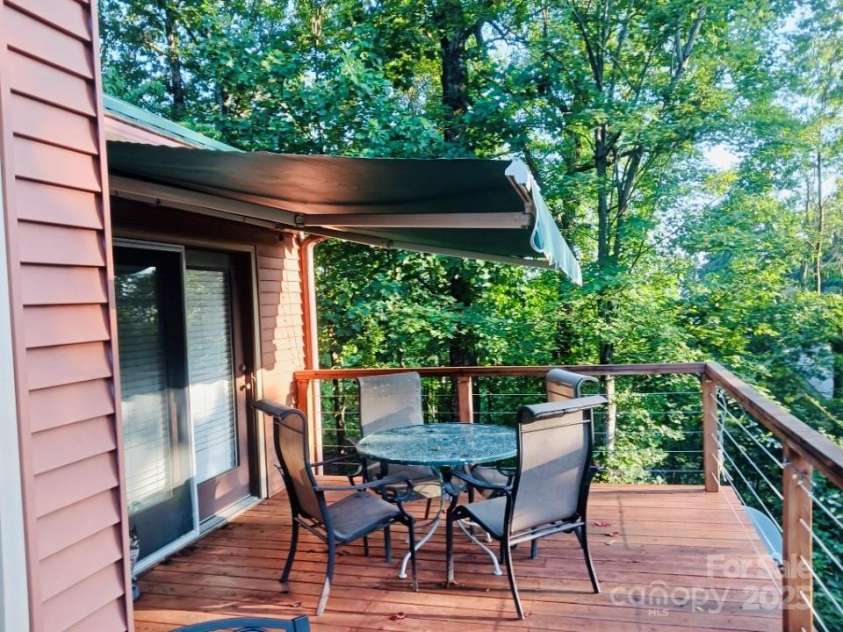 8799 Lisa Trail, Connelly Springs, NC 28612.  MLS# CAR4292879, YatesRealty ID 32719. Retractable Awning with Remote Control Operation