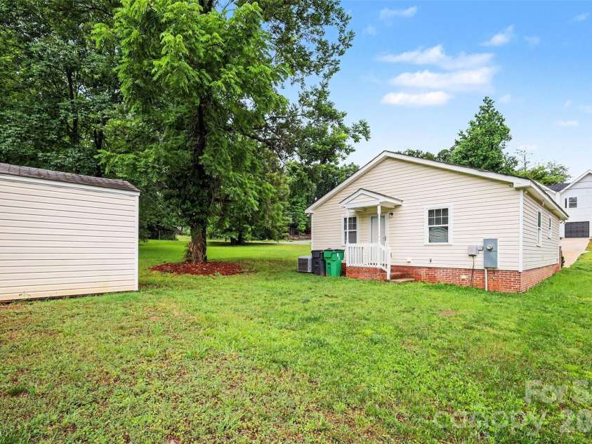 3608 Corbett Street, Charlotte, NC 28208.  MLS# CAR4396123, YatesRealty ID 32720. Backyard with storage shed