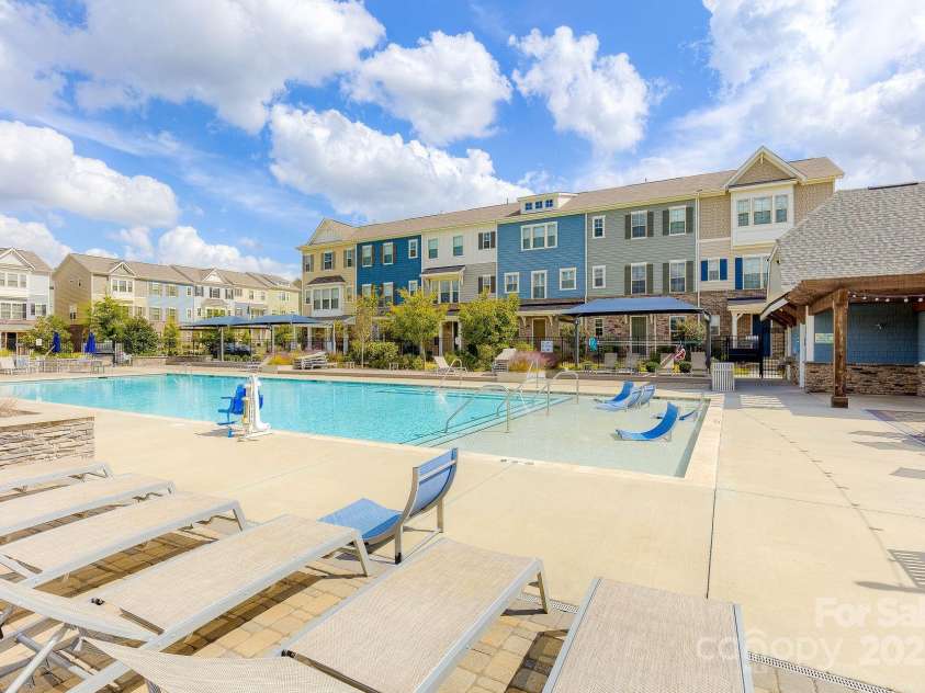 9324 Ainslie Downs Street, Charlotte, NC 28273.  MLS# CAR4276597, YatesRealty ID 32727. Complete with gas grills and changing rooms!