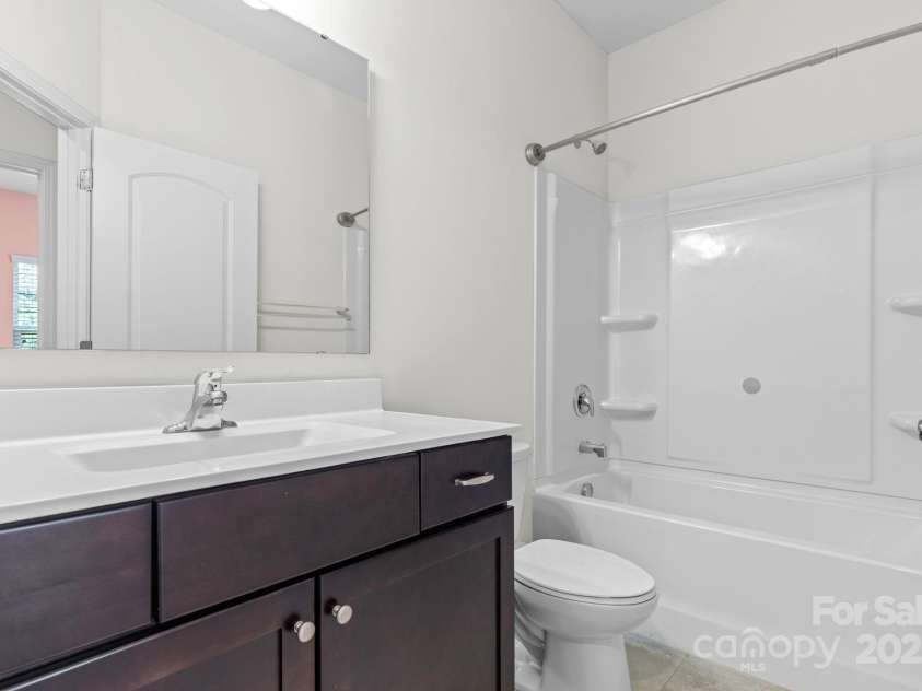 9324 Ainslie Downs Street, Charlotte, NC 28273.  MLS# CAR4276597, YatesRealty ID 32727. Guest full bath on upper level