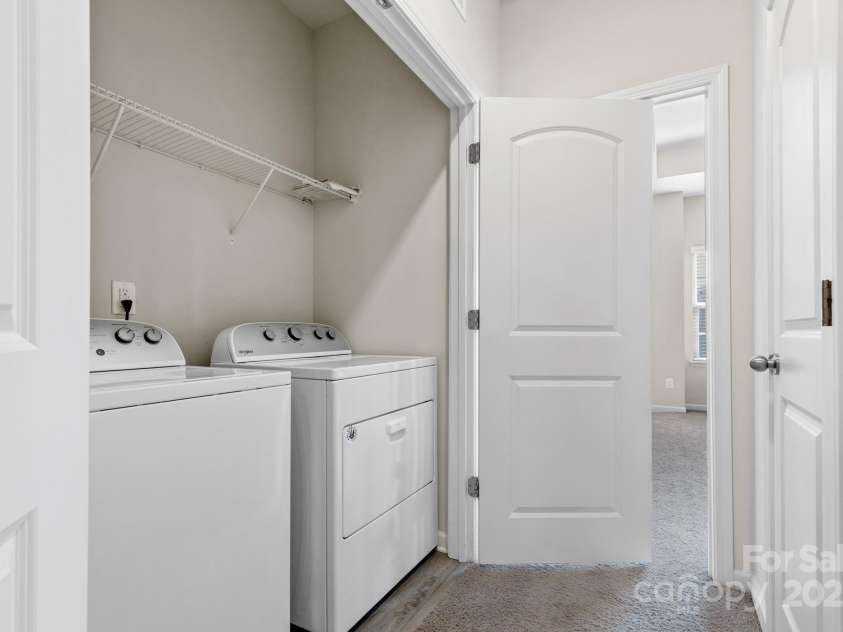9324 Ainslie Downs Street, Charlotte, NC 28273.  MLS# CAR4276597, YatesRealty ID 32727. Laundry on bedroom level