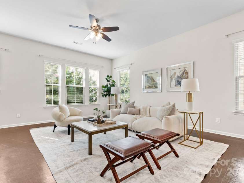 9324 Ainslie Downs Street, Charlotte, NC 28273.  MLS# CAR4276597, YatesRealty ID 32727. Living room with ample windows