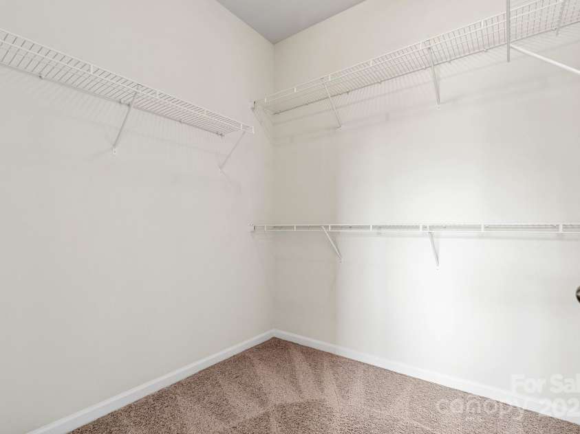 9324 Ainslie Downs Street, Charlotte, NC 28273.  MLS# CAR4276597, YatesRealty ID 32727. Primary walk-in closet