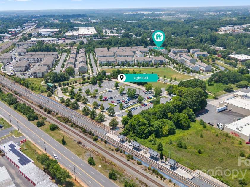 9324 Ainslie Downs Street, Charlotte, NC 28273.  MLS# CAR4276597, YatesRealty ID 32727. Seconds from a convenient light rail stop