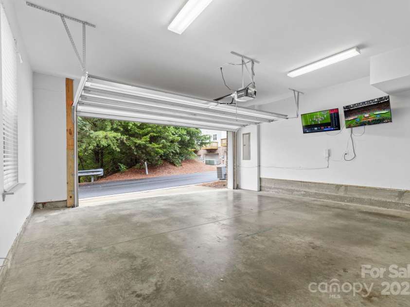 9324 Ainslie Downs Street, Charlotte, NC 28273.  MLS# CAR4276597, YatesRealty ID 32727. Space for parking or entertaining and great privacy behind!