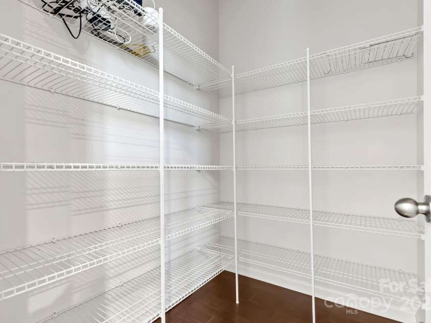 9324 Ainslie Downs Street, Charlotte, NC 28273.  MLS# CAR4276597, YatesRealty ID 32727. Walk-in pantry