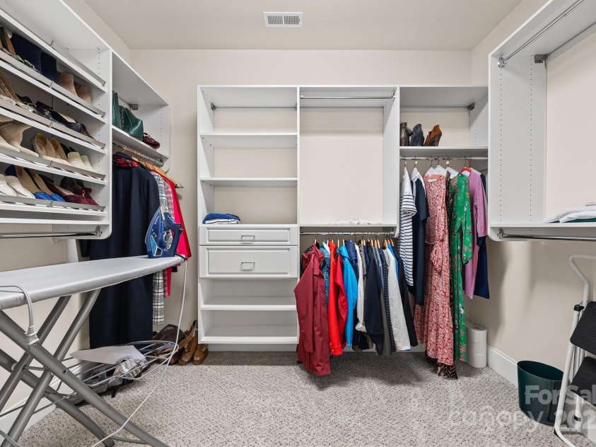 703 English Tudor Lane, Charlotte, NC 28211.  MLS# CAR4259545, YatesRealty ID 32734. Closet system in huge primary closet