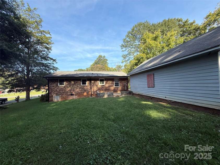 105 Smith Lane, Mount Holly, NC 28120.  MLS# CAR4305235, YatesRealty ID 32735. View of Back of House