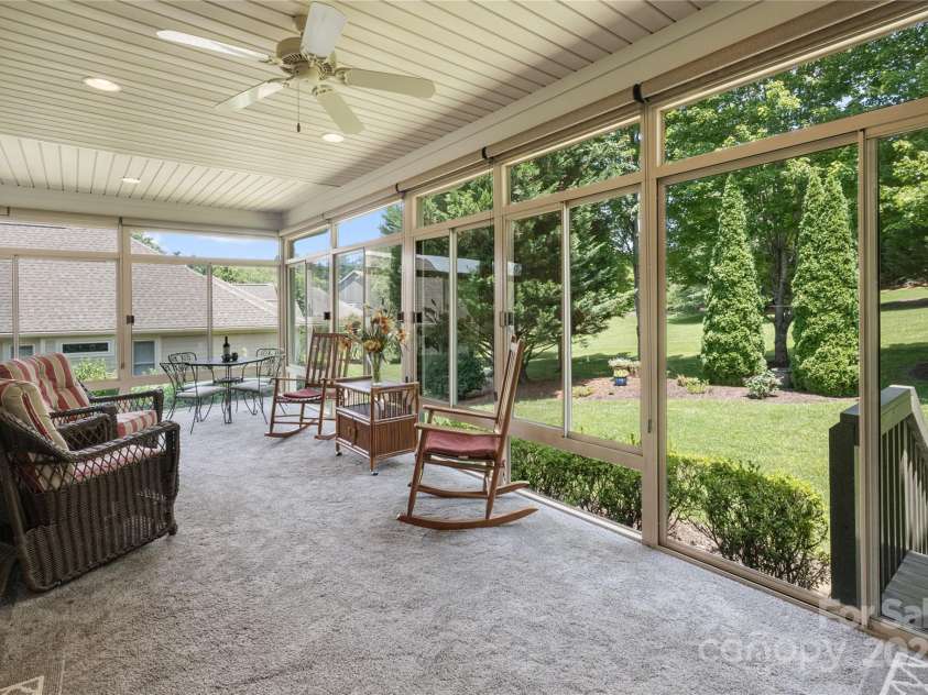 245 Whistlewood Lane, Hendersonville, NC 28739.  MLS# CAR4280105, YatesRealty ID 32736. Wrap Around 3 Season Room with Beautiful Views.