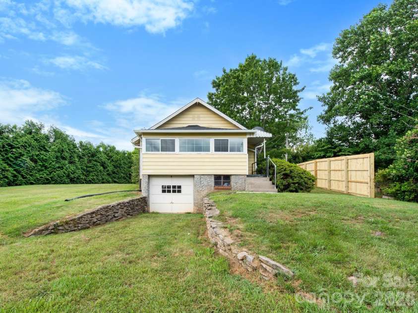 25 Bailey Road, Candler, NC 28715.  MLS# CAR4387001, YatesRealty ID 32736. Back of the House