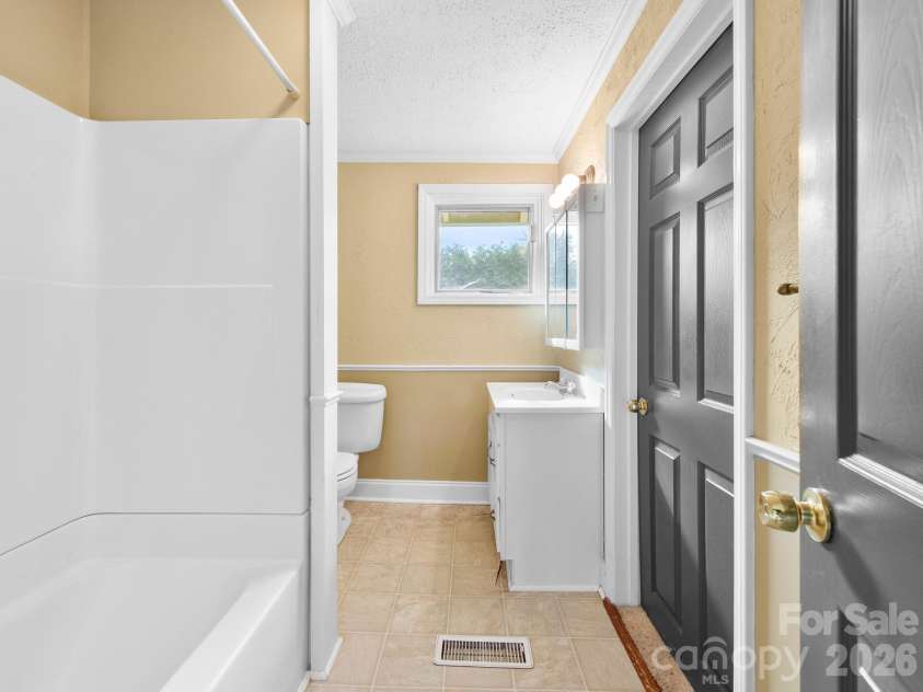25 Bailey Road, Candler, NC 28715.  MLS# CAR4387001, YatesRealty ID 32736. Bathroom