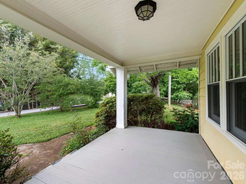 25 Bailey Road, Candler, NC 28715.  MLS# CAR4387001, YatesRealty ID 32736. Front porch