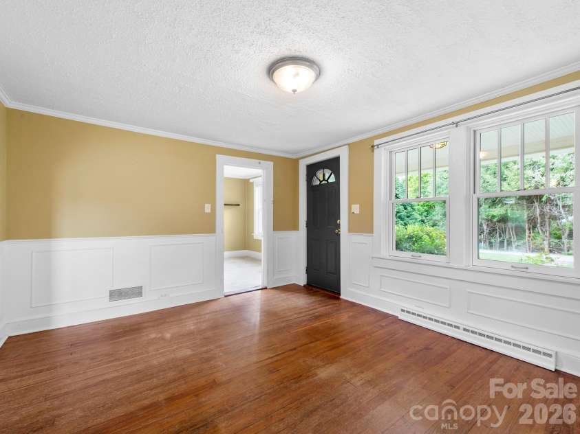 25 Bailey Road, Candler, NC 28715.  MLS# CAR4387001, YatesRealty ID 32736. Living Room