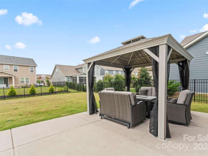 1314 Raelea Drive, Indian Trail, NC 28079.  MLS# CAR4280911, YatesRealty ID 32738. 62x58 level fenced backyard with patio and gazebo.