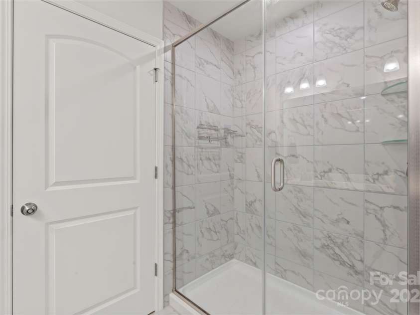 1314 Raelea Drive, Indian Trail, NC 28079.  MLS# CAR4280911, YatesRealty ID 32738. Roomy primary ensuite with large tile shower.