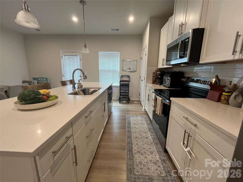 1105 May Apple Drive, Matthews, NC 28104.  MLS# CAR4341799, YatesRealty ID 3274. 