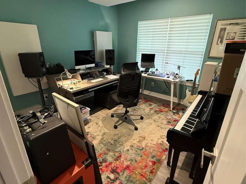 8533 Everwood Avenue, Huntersville, NC 28078.  MLS# CAR4290997, YatesRealty ID 32748. BR 3 is 11'x 11.4 and currently used as an office.  It has sound-absorbing panels that can easily be removed, a double window, and a double closet!