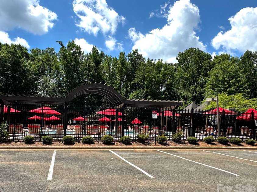 13933 Pinyon Pine Lane, Charlotte, NC 28215.  MLS# CAR4384167, YatesRealty ID 32749. Community pool