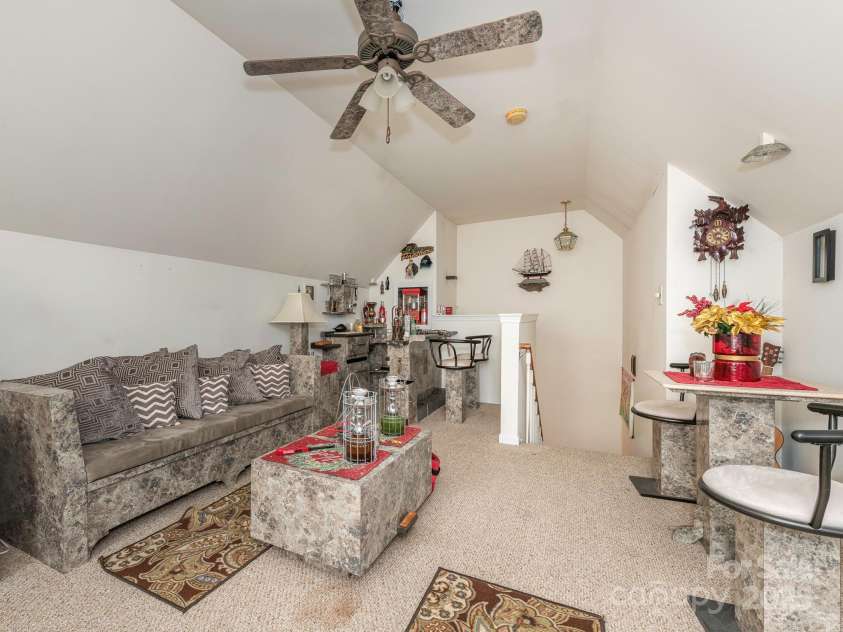 7941 Mossycup Drive, Charlotte, NC 28215.  MLS# CAR4292875, YatesRealty ID 32751. Upper level bonus room (Front Room Over Garage)