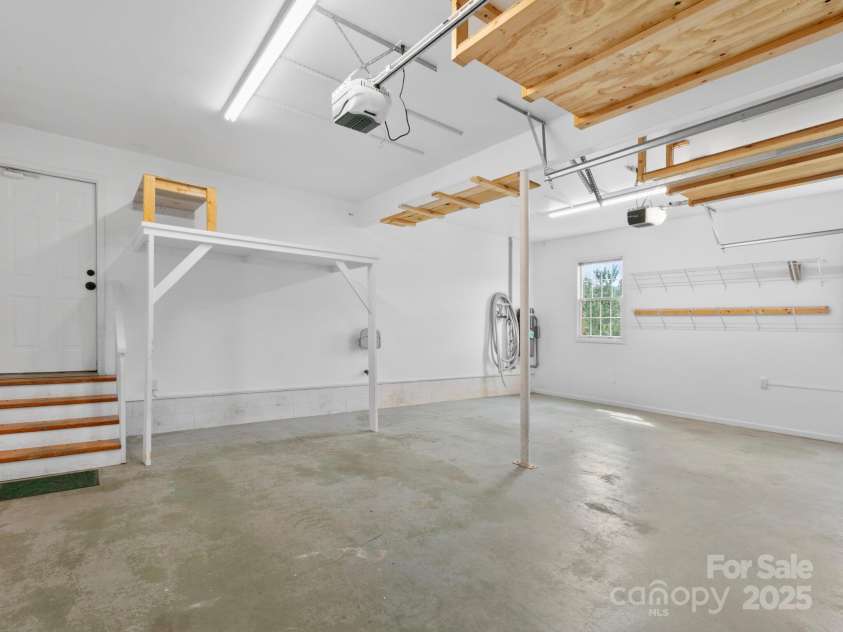 206 Bridle Path, Candler, NC 28715.  MLS# CAR4291478, YatesRealty ID 32755. 2 car garage