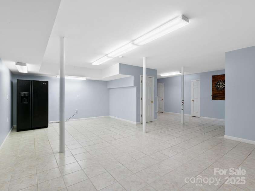 206 Bridle Path, Candler, NC 28715.  MLS# CAR4291478, YatesRealty ID 32755. Den 