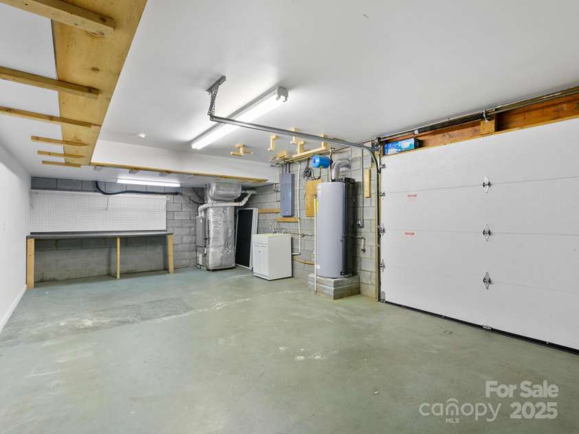 206 Bridle Path, Candler, NC 28715.  MLS# CAR4291478, YatesRealty ID 32755. Workshop/storage 