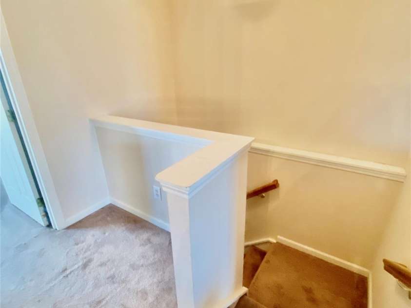 6025 Creft Circle, Indian Trail, NC 28079.  MLS# CAR4387929, YatesRealty ID 32758. Staircase view from Upstairs Full Bathroom.