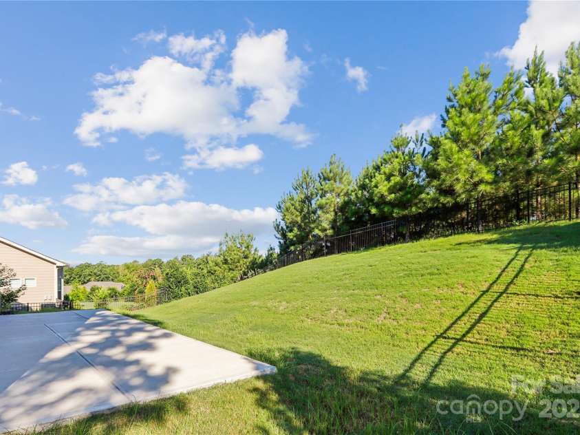 16004 Deer River Road, Charlotte, NC 28278.  MLS# CAR4171564, YatesRealty ID 3276. Extended patio in back yard