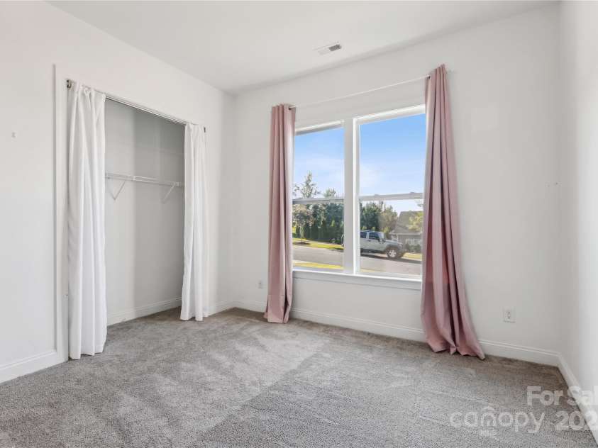 16004 Deer River Road, Charlotte, NC 28278.  MLS# CAR4171564, YatesRealty ID 3276. Front Bedroom with private bath