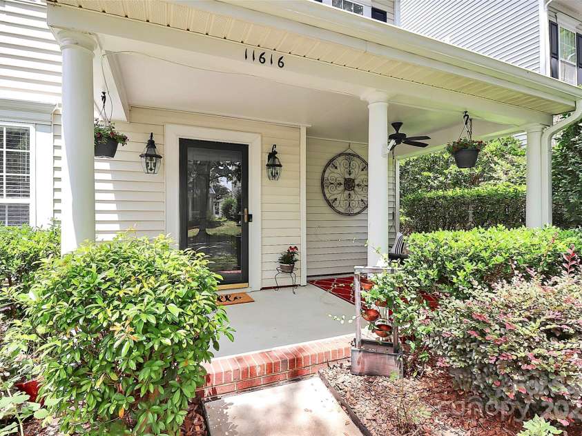 11616 Kingsley View Drive, Charlotte, NC 28277.  MLS# CAR4284494, YatesRealty ID 32762. Enjoy the porch and swing