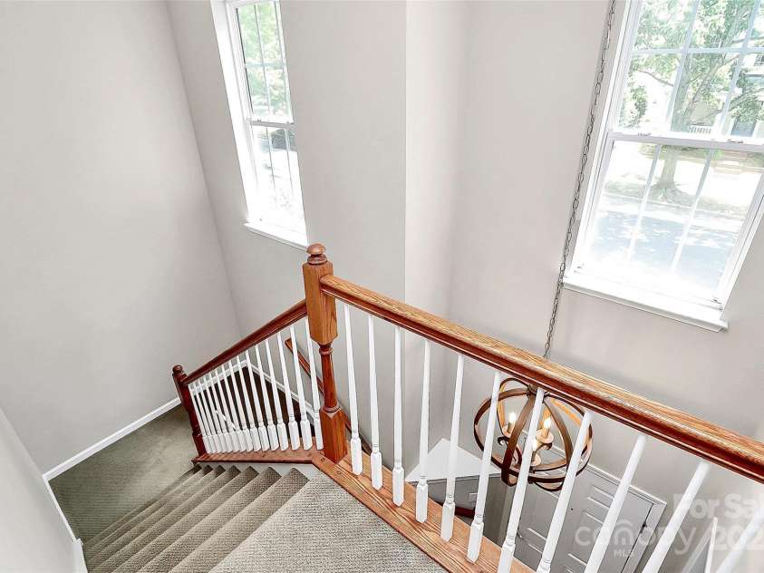 11616 Kingsley View Drive, Charlotte, NC 28277.  MLS# CAR4284494, YatesRealty ID 32762. Front stairs with lots of light