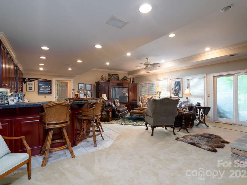 117 Whitley Mill Road, New London, NC 28127.  MLS# CAR4289089, YatesRealty ID 32766. Basement bar