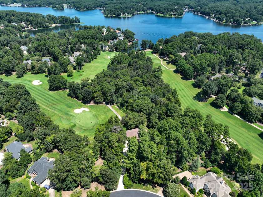 117 Whitley Mill Road, New London, NC 28127.  MLS# CAR4289089, YatesRealty ID 32766. Golf and lake living