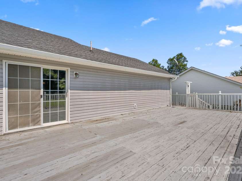 27 Eden Glen Road, Black Mountain, NC 28711.  MLS# CAR4292054, YatesRealty ID 3277. Seamless indoor-outdoor living with direct access from the dining room.